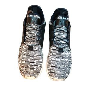 Men  size 9 1/2 Adidas Xplorer Black and White shoes.